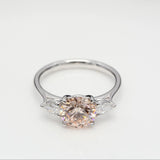 2.00 ct Round Fancy Pink Diamond ring with 2 side diamonds