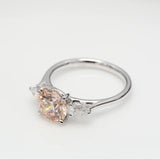 2.00 ct Round Fancy Pink Diamond ring with 2 side diamonds
