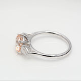 2.00 ct Round Fancy Pink Diamond ring with 2 side diamonds