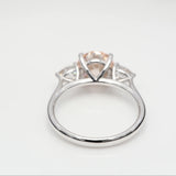 2.00 ct Round Fancy Pink Diamond ring with 2 side diamonds
