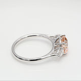 2.00 ct Round Fancy Pink Diamond ring with 2 side diamonds
