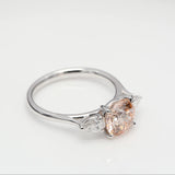 2.00 ct Round Fancy Pink Diamond ring with 2 side diamonds
