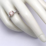 2.00 ct Round Fancy Pink Diamond ring with 2 side diamonds