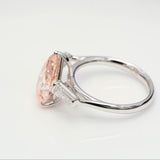 3.00 ct Pear shape Fancy Pink Diamond ring with 2 side diamonds
