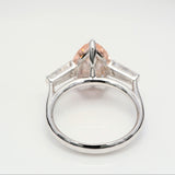 3.00 ct Pear shape Fancy Pink Diamond ring with 2 side diamonds
