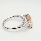 3.00 ct Pear shape Fancy Pink Diamond ring with 2 side diamonds
