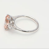 3.00 ct Oval shape Fancy Pink Diamond ring with 2 side diamonds