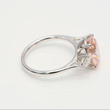 3.00 ct Oval shape Fancy Pink Diamond ring with 2 side diamonds