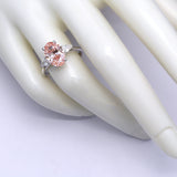 3.00 ct Oval shape Fancy Pink Diamond ring with 2 side diamonds